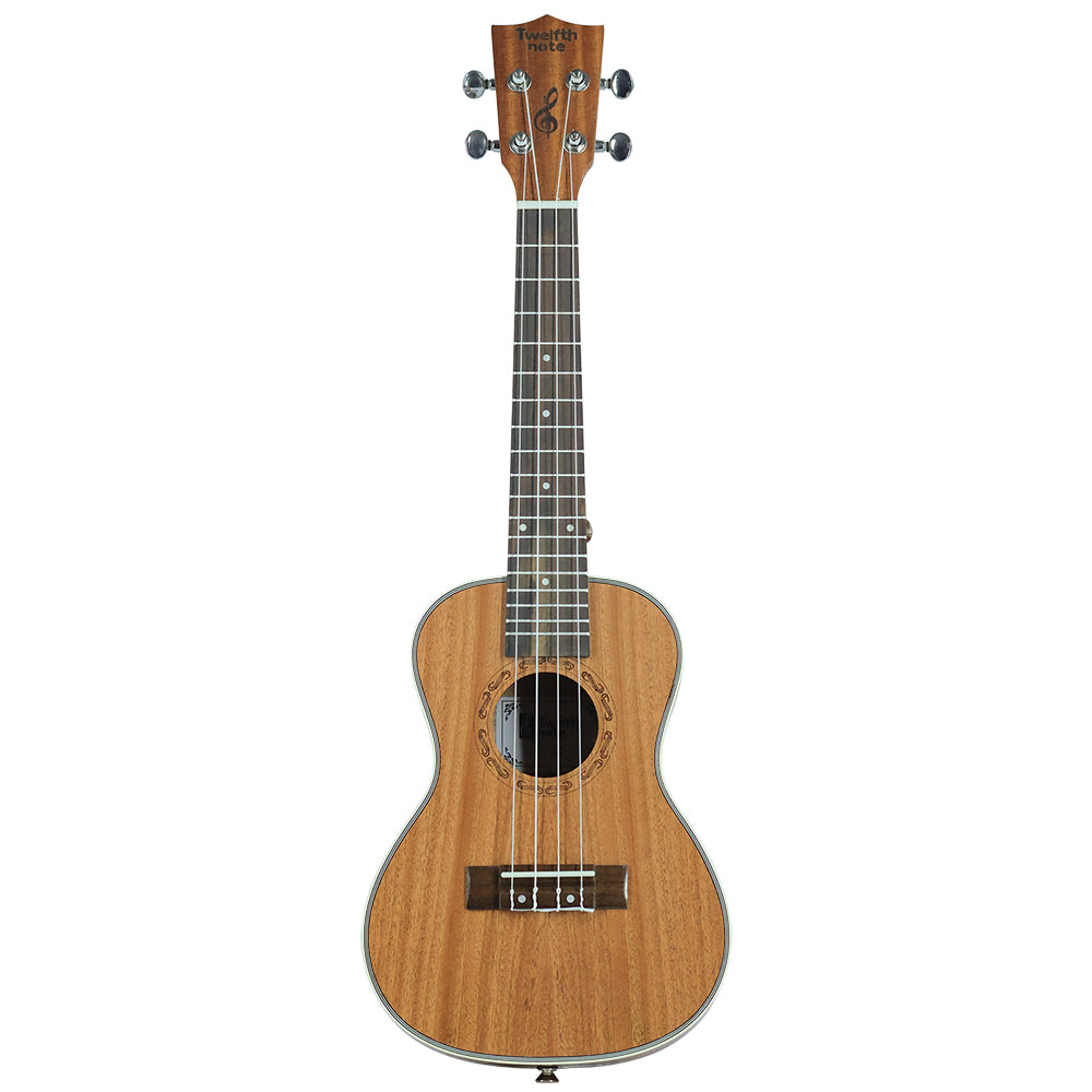 Front view of Twelfth Note Crafted Series acoustic ukulele featuring a classical laser-engraved soundhole rosette and white body binding